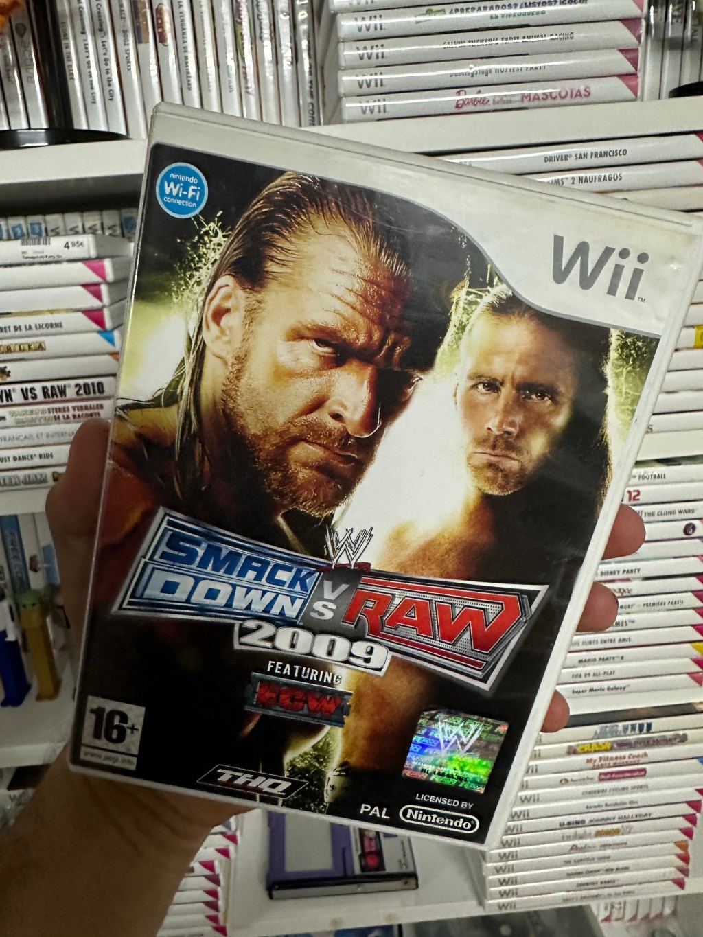 Step into the ring with Smack Down vs Raw 2009 (Nintendo Wii) – A Wrestling Showdown!&nbsp;🤼‍♂️🎮🔥